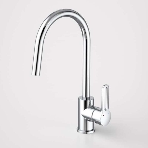 A chrome-plated kitchen faucet